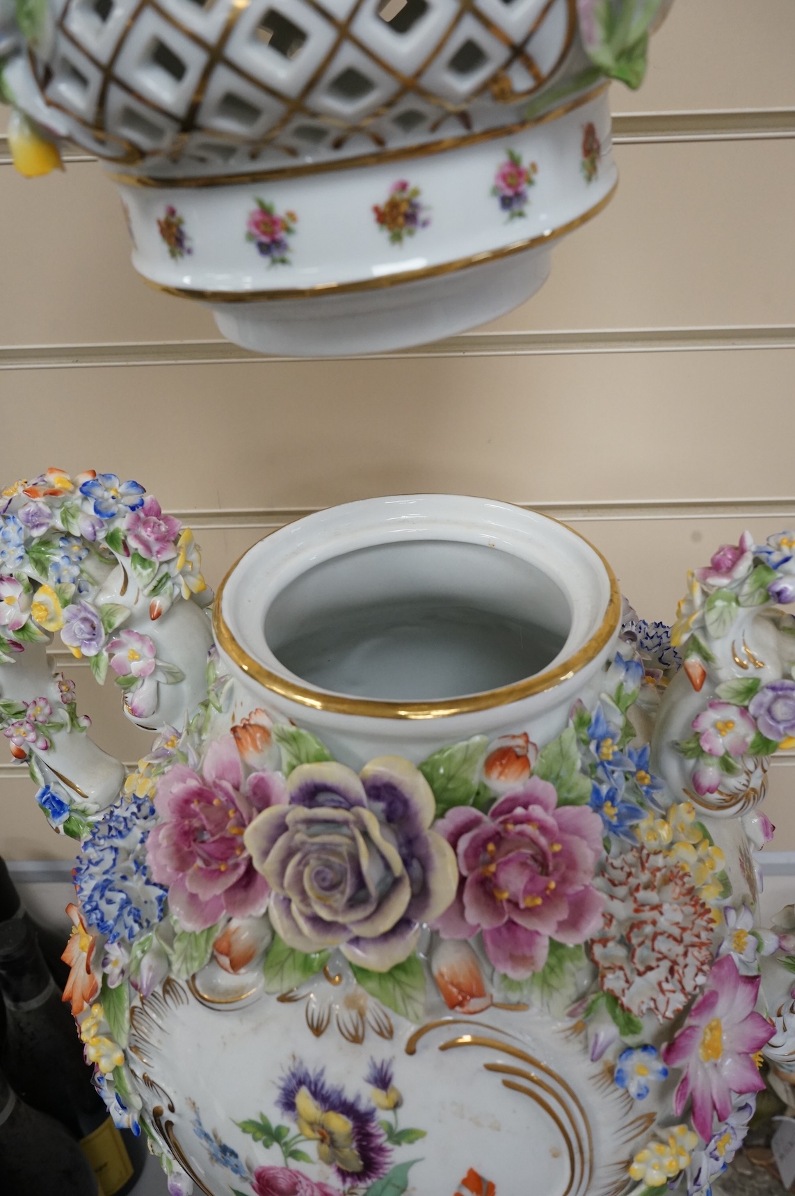A large 20th century German porcelain two-handled pedestal vase and cover, 89cm